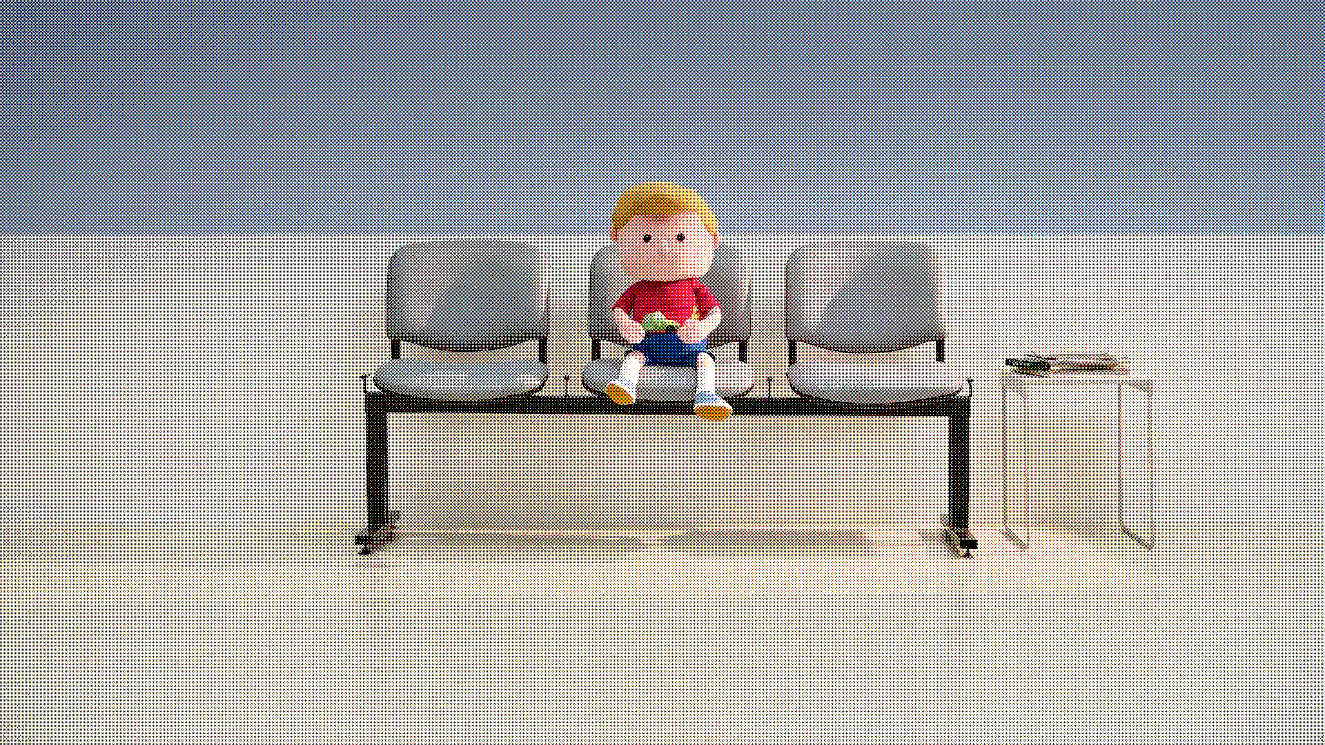 The doll of Ralph sitting on a bench